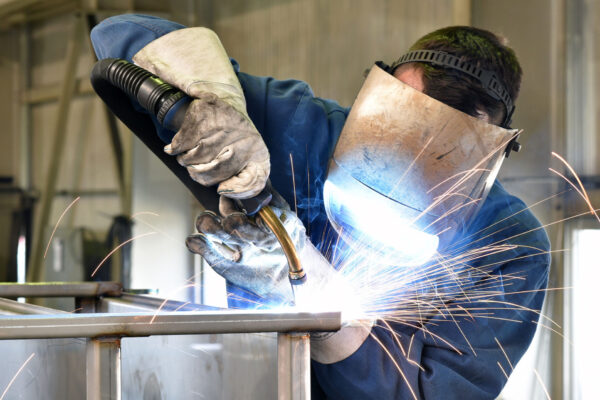 Constructio-welder-works-in-metal-construction—construction-and-processing-of-steel-components Constructio-welder-works-in-metal-construction---construction-and-processing-of-steel-components